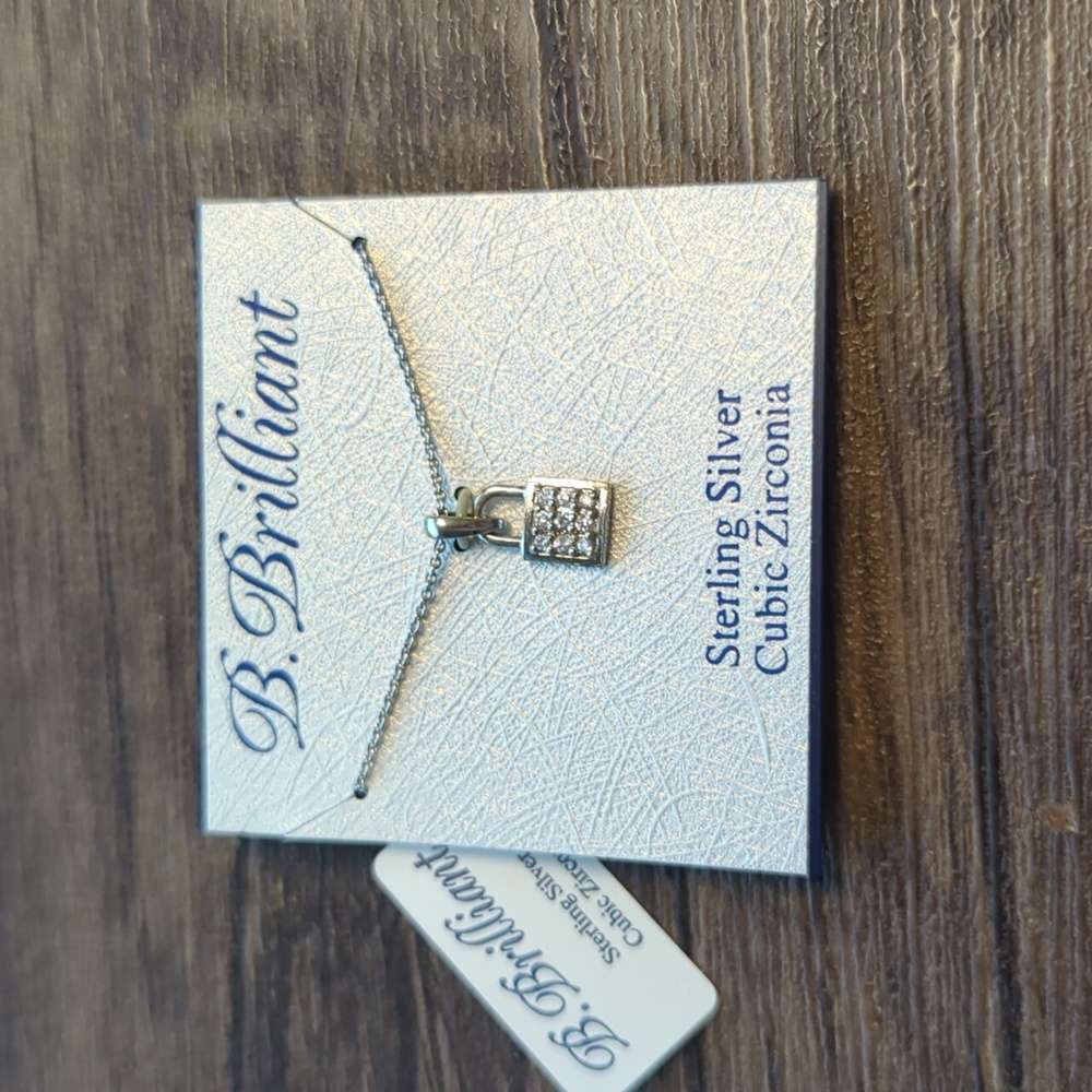 B. Brilliant sterling silver paddle lock necklace Macy's